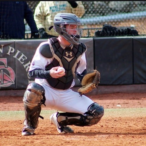 Dylan Love playing catcher