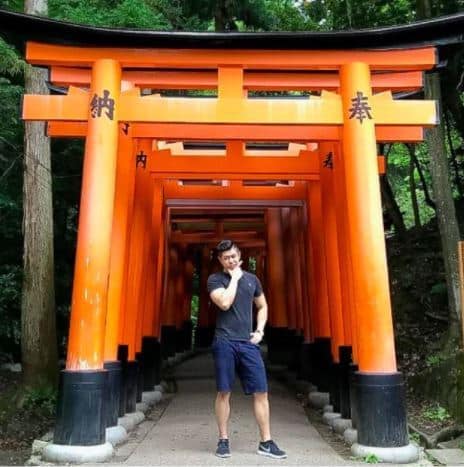 Kevin Zheng travel picture below orange wooden arch