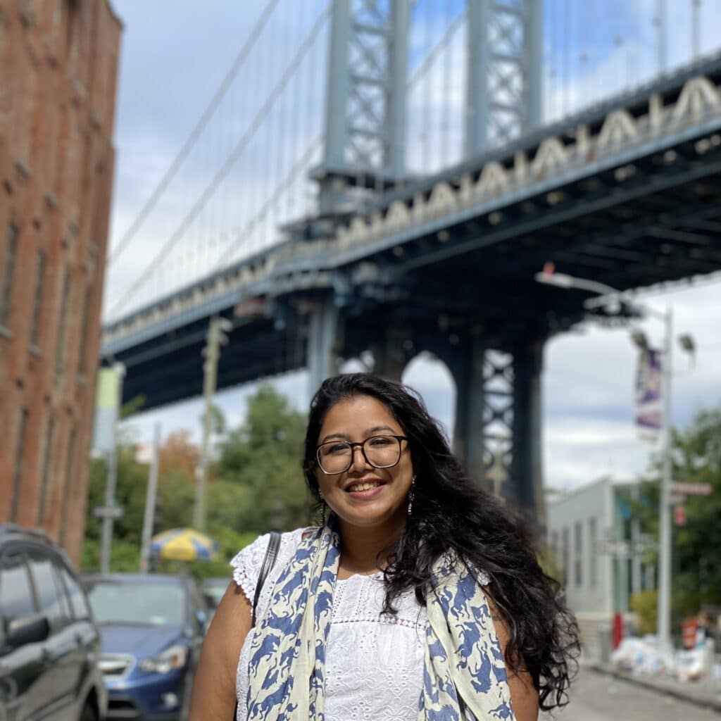 Anvitha Shivakumar in front of DUMBO bridge