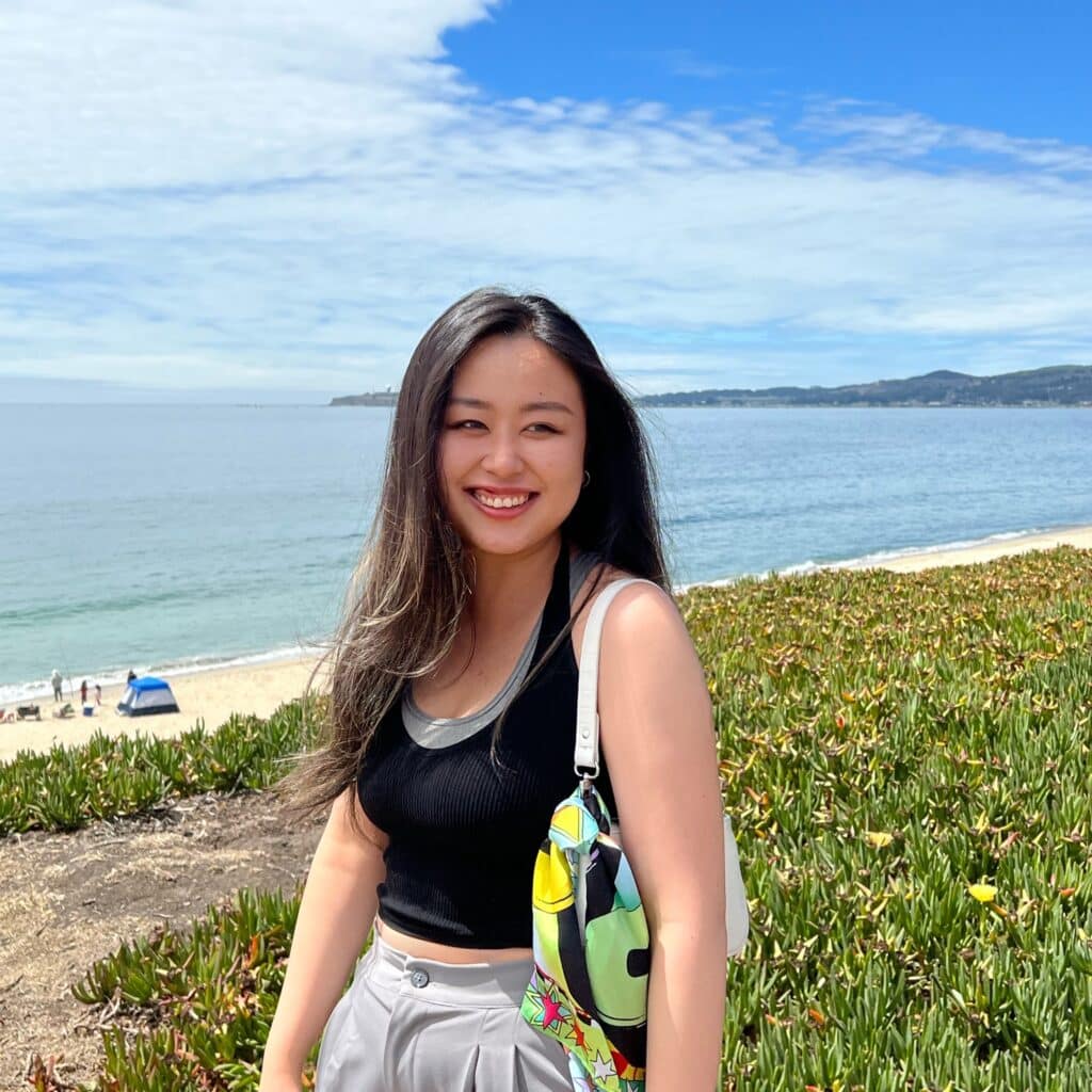 Ella Hu in a flower field
