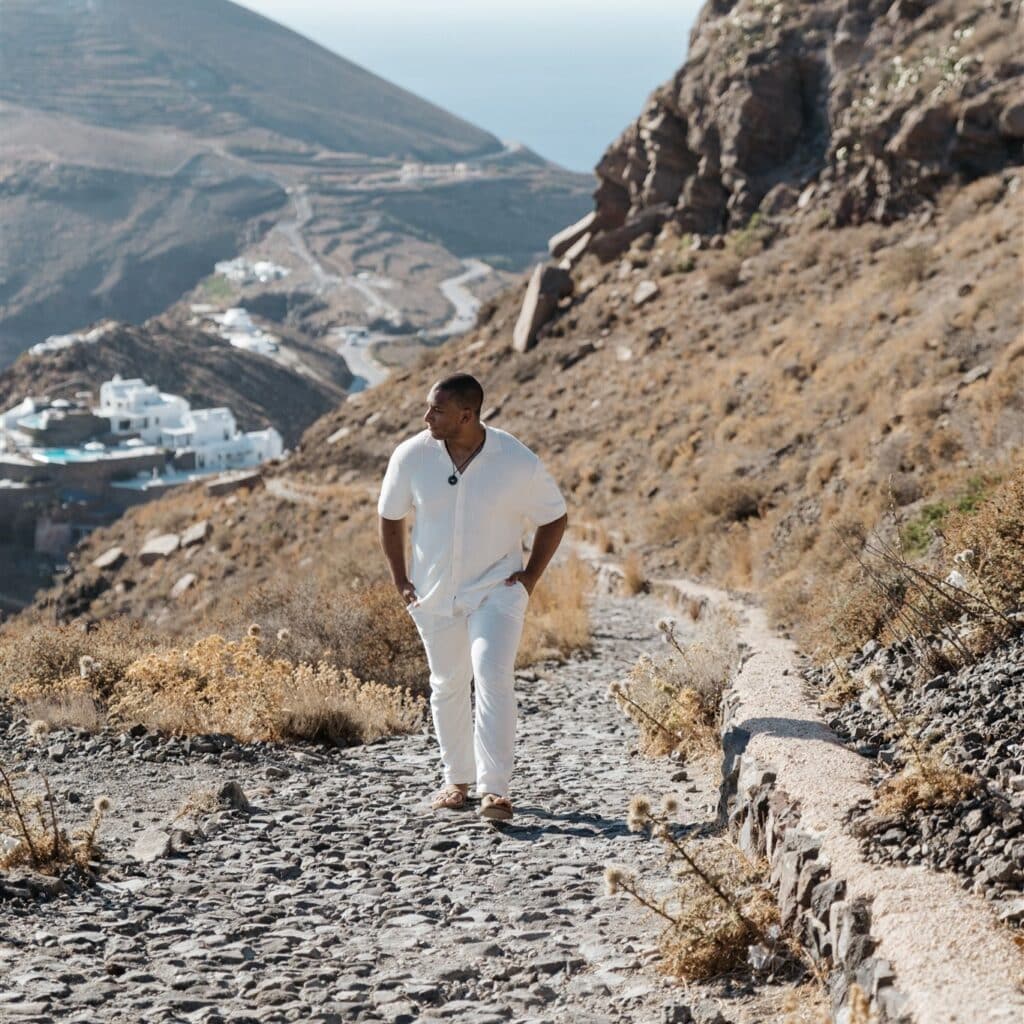 Jose Black walking on the beach