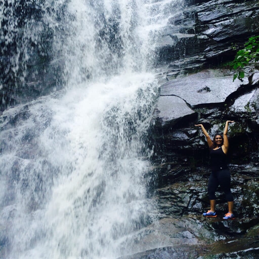 yesha nar at a waterfall